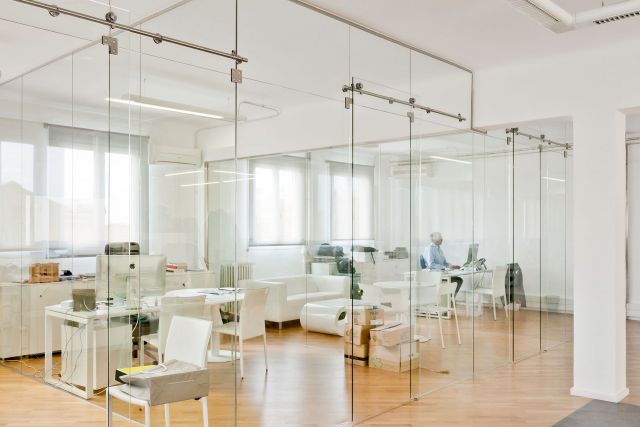 Glass office with sliding door
